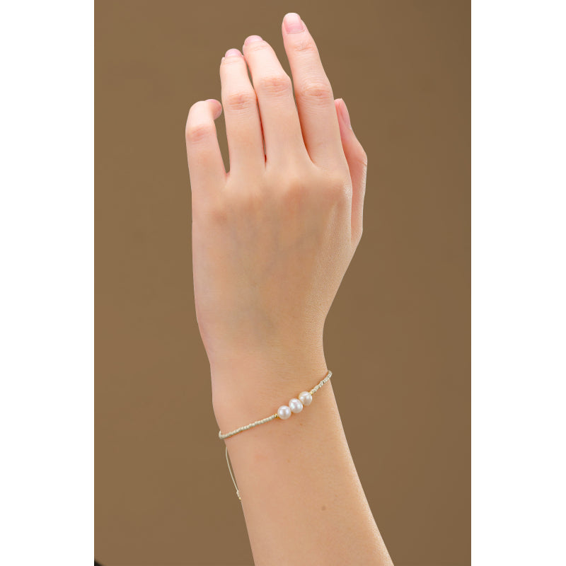 Pulsera hilo Perlas