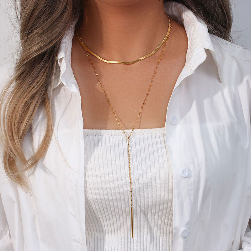 Collar doble con barra