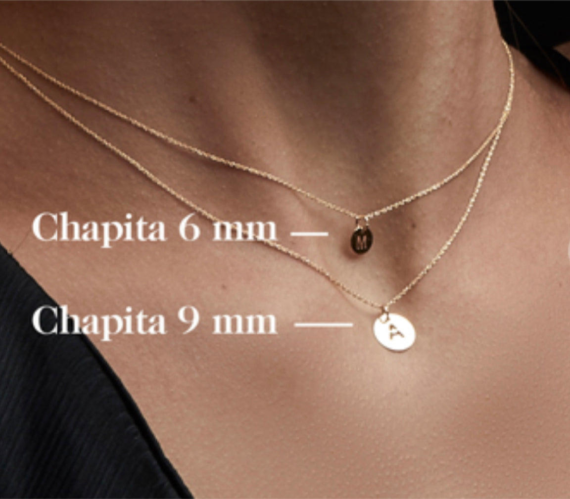 Collar con letra en oro 18kts