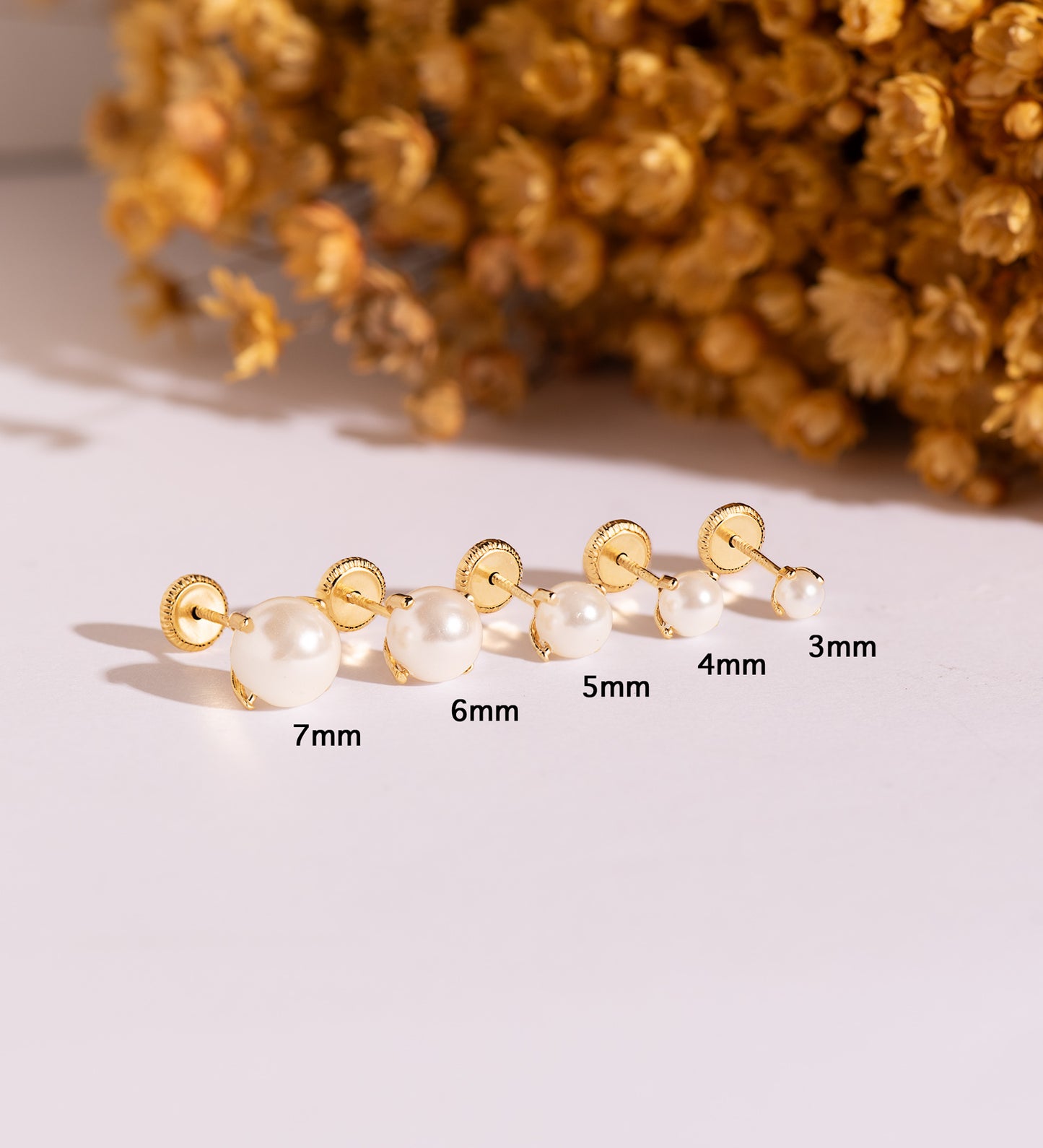 Pendientes de oro con perla