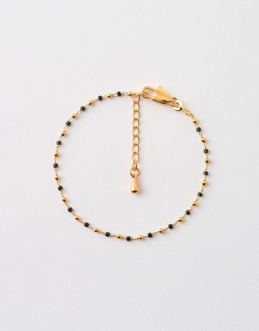 Pulsera bolitas y piedras