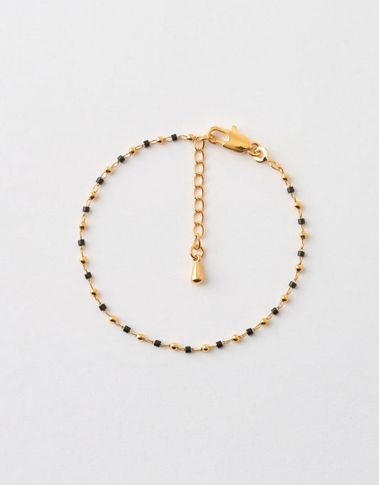 Pulsera bolitas y piedras